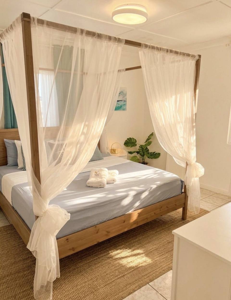 Habitación principal con dosel de Villa 1